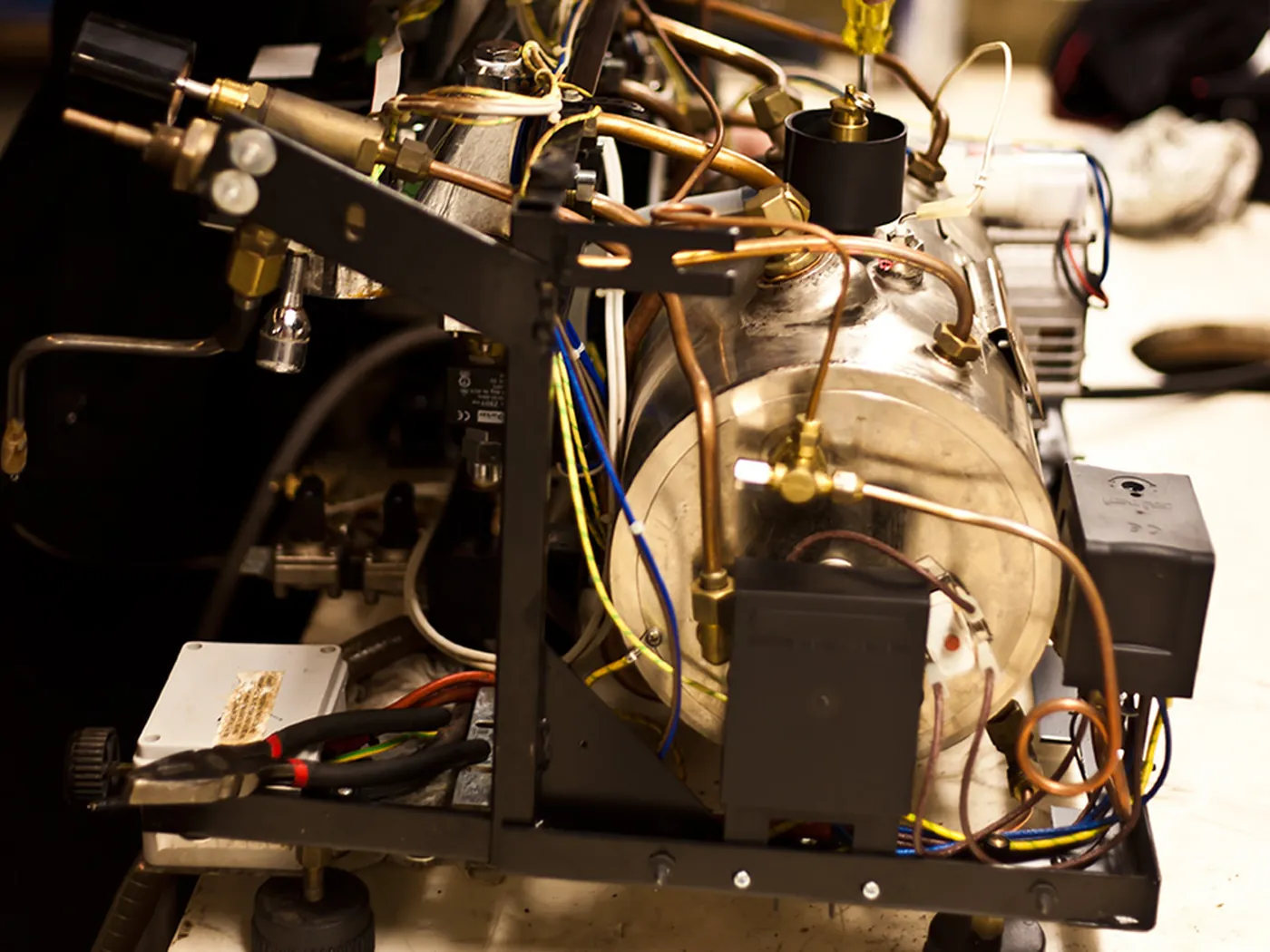 Cutaway diagram of espresso machine internal boiler and plumbing